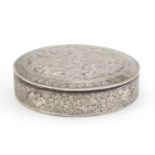 Indian circular silver box and cover embossed with birds amongst foliage, impressed marks to the