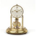 German brass anniversary clock with glass dome, by Kein, 19cm high :For Further Condition Reports