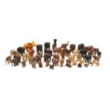 Large collection of mostly wooden elephants including some ebony, the largest 20cm high :For Further