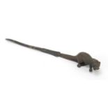 Patinated bronze otter design letter opener, 21.5cm in length :For Further Condition Reports