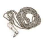 Unmarked silver vinaigrette in the form of a boot on a unmarked white metal longuard chain, 44.0g :
