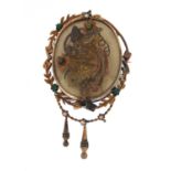 Victorian unmarked gold morning brooch (tests as 15ct) decorated with a bird of Paradise amongst