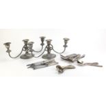 Pair of silver plated three branch candelabra and silver plated cutlery, the candelabra 38cm wide :