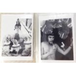 Photographic prints of film stars and singers arranged in an album. :For Further Condition Reports