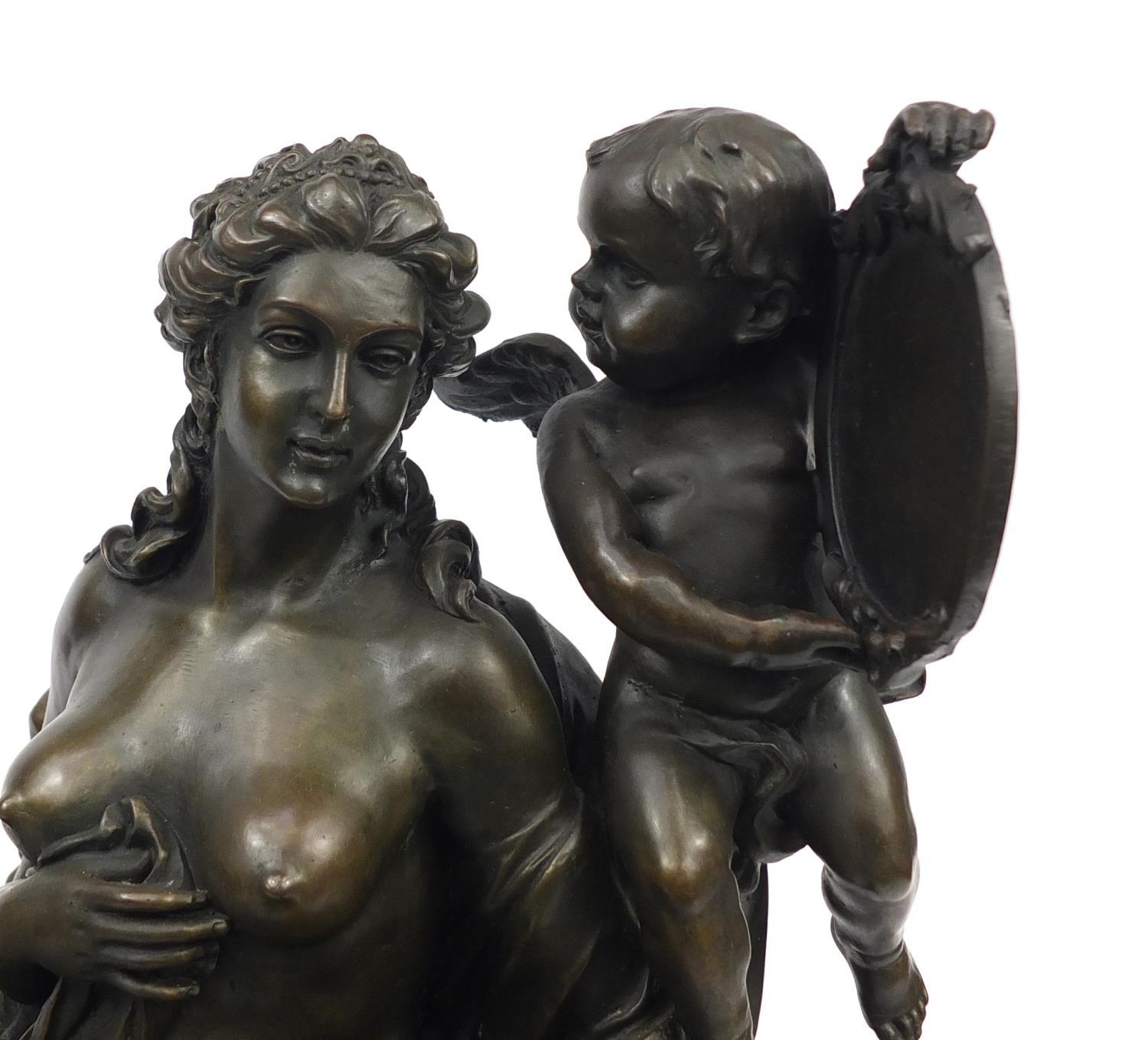 Large patinated bronze sculpture of a nude female in a throne with putti holding a mirror, raised on - Image 2 of 4