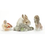 Two Lladro animals and Royal Crown Derby teal duckling paperweight with gold coloured stopper, the