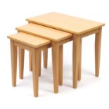 Nest of three beech occasional tables by John Coyle, the largest 50cm H x 60cm W x 37cm D :For