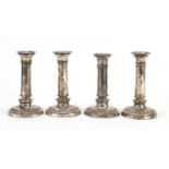 Set of four silver plated candlesticks, each 17cm high :For Further Condition Reports Please Visit