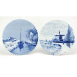 Two Dutch Delft plaques including one hand painted with a figure before a windmill by Chattel,