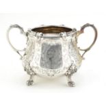 Large Victorian silver twin handled sugar bowl raised on four feet, by William Hewitt, engraved with