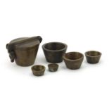Graduated set of five Indian bronze weights with case, 4cm high :For Further Condition Reports