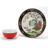 Chinese porcelain famille noir plate and a sang-de-boeuf bowl, the largest 24.5cm in diameter :For