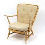 Ercol light elm Windsor stick back arm chair, 83cm high :For Further Condition Reports Please