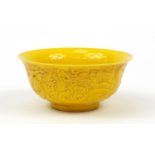 Chinese porcelain yellow glazed dragon bowl, impressed character marks to the base, 16cm in diameter