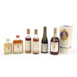 Six bottles of alcohol including Bollinger champagne and Martell cognac :For Further Condition
