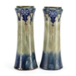 Pair of Art Nouveau Royal Doulton vases, decorated in low relief with stylised flowers, impressed