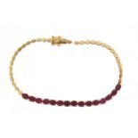 14ct gold garnet bracelet, 16cm in length, 7.8g :For Further Condition Reports Please Visit Our
