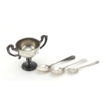 Victorian silver twin handled pedestal trophy and three silver teaspoons, the trophy hallmarked