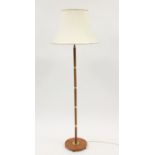 Teak and brass standard lamp with shade, 154cm high :For Further Condition Reports Please Visit