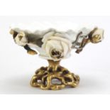 Continental porcelain centrepiece relief decorated with white roses and gilt leaves, 14cm high :