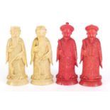 Four Chinese Canton ivory emperors each finely carved with flowers, each 8cm high :For Further