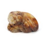 Chinese white and russet jade carving of a lion :For Further Condition Reports Please Visit Our
