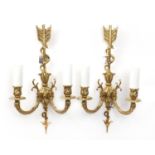 Pair of French style two branch brass wall sconces of arrow design, 44cm high :For Further Condition