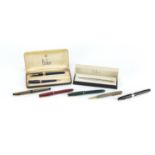 Vintage and later fountain pens and propelling pencils, some with gold nibs, including Parker and