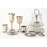 Silverplate and a silver christening tankard including a four bottle cruet on stand :For Further