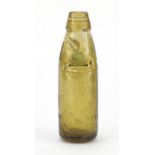 19th century amber glass Codd bottle advertising Groves & Whitmall of Salford, 18.5cm high :For