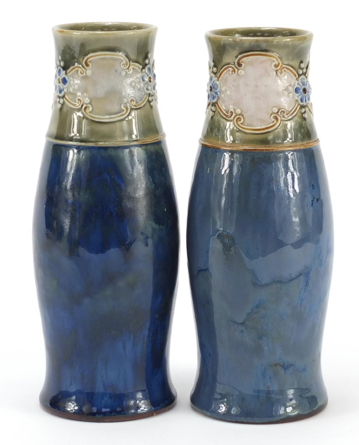 Pair of Royal Doulton stoneware vases, decorated with flowers, numbered 3079, each 20cm high :For