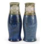 Pair of Royal Doulton stoneware vases, decorated with flowers, numbered 3079, each 20cm high :For