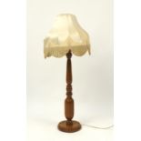 Turned oak floor standing lamp with shade, 93cm high :For Further Condition Reports Please Visit Our