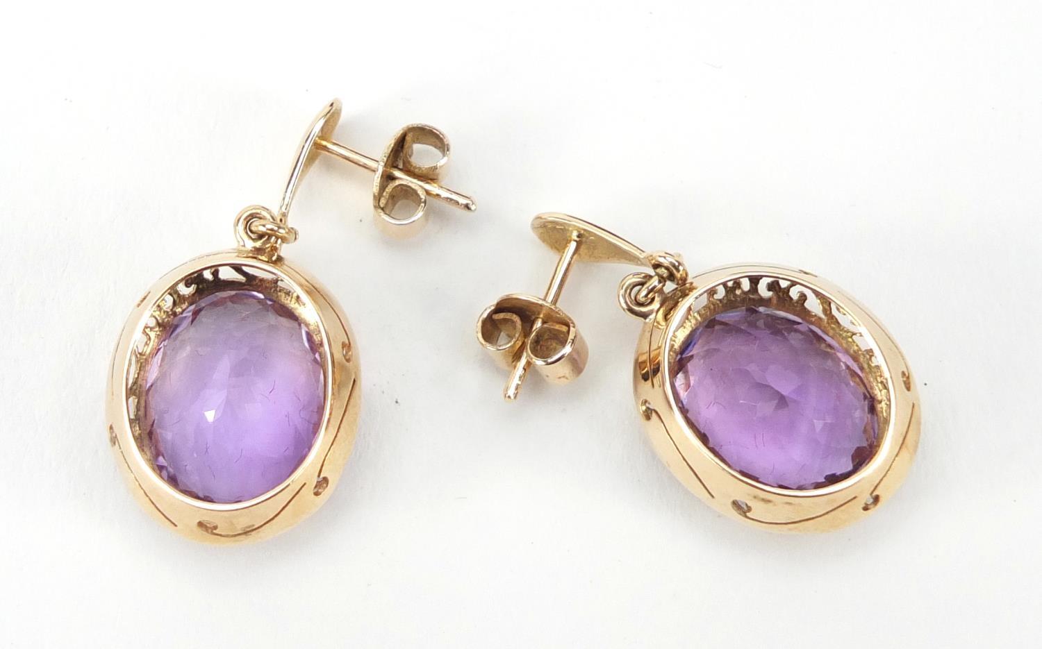 Pair of unmarked gold amethyst earrings, 3.2cm in length, 8.4g :For Further Condition Reports Please - Image 3 of 7