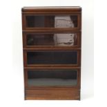 Globe Wernicke oak four section bookcase, 142cm Hx 86cm W x 26.5cm D :For Further Condition