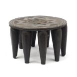 Tribal interest carved hardwood stool, 35.5cm in diameter :For Further Condition Reports Please