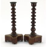 Pair of 19th century walnut bobbin turned candlesticks, each 33cm high :For Further Condition