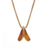 9ct gold amber pendent, 2cm in length, 2.2g on a 9ct gold necklace, 48cm in length, 7.0g :For