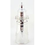 Large silver plated cocktail shaker in the form of a lighthouse, 36cm high :For Further Condition