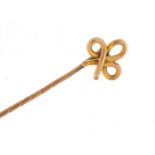 Unmarked gold tie pin, housed in a Goldsmiths and Silversmiths Company tooled leather box,