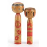 Two Japanese Kockeshi dolls, the largest 24cm high :For Further Condition Reports Please Visit Our
