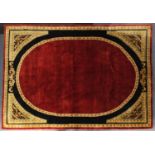 Rectangular Indian red ground carpet having an allover floral design, 365cm x 248cm :For Further
