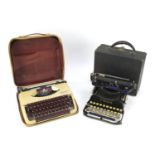 Two vintage typewriters with cases including a folding Corona :For Further Condition Reports