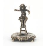 Edward VII silver model of a cherub standing on a chair, by Singleton Benda & Co Ltd, London 1902,