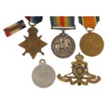 British military World War I trio with Mons star, Royal Artillery cap badge and dog tag, the trio
