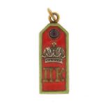 Russian silver gilt and enamel pendant, set with a cabochon garnet, 5cm in length, 11.0g :For