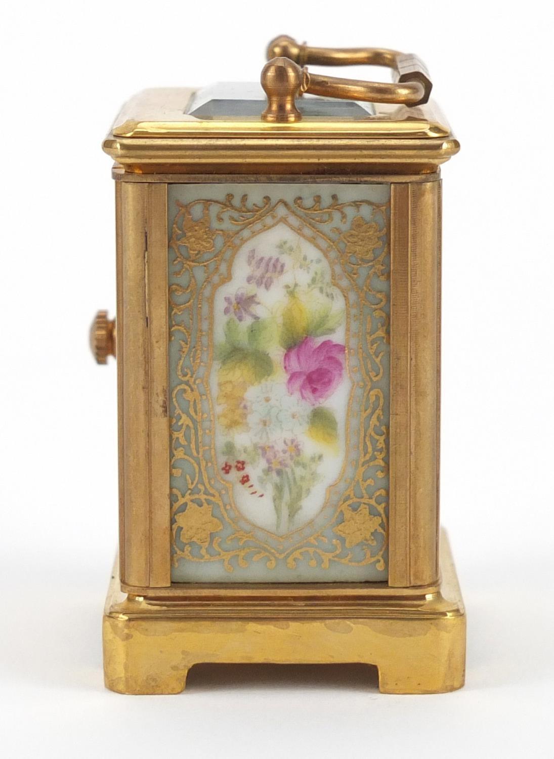 Miniature brass cased carriage clock with porcelain panels, hand painted and gilded with flowers, - Image 7 of 8