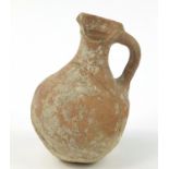 Roman terracotta wine flagon, 19.5cm high :For Further Condition Reports Please Visit Our Website-