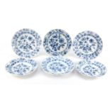 Six Meissen porcelain plates, each hand painted in the Blue Onion pattern, crossed sword marks to
