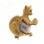 Good unmarked gold Lemur multi gem brooch (tests as 14ct+) with pearl body, set with diamonds,